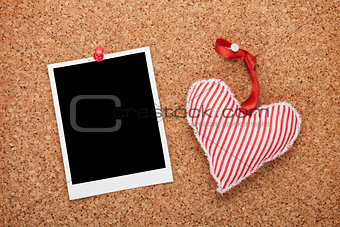 Blank instant photo and red heart