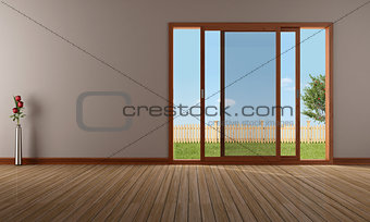 Empty living room with open sliding window 