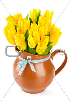 yellow tulips flowers in jug
