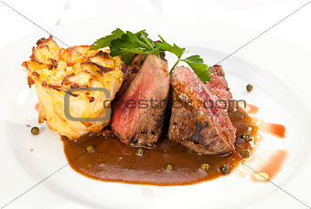 Grilled Sirloin with pepper sauce and potatoes