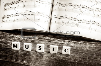 Music notes sheet and letters music