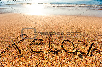 inscription Relax on the sand by the sea