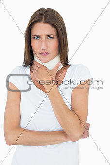 Portrait of a young woman wearing cervical collar