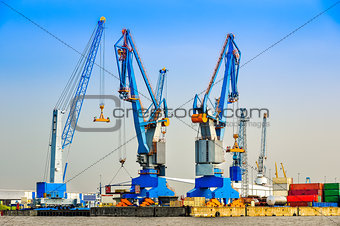 Large industrial cargo cranes in the harbor