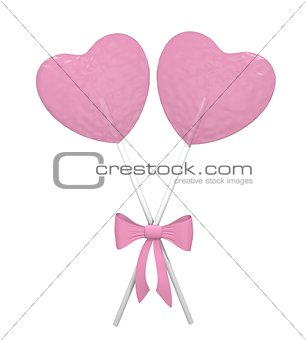 Two pink heart lollipops