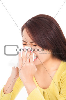 young woman is sneezing with painful face  
