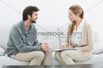 Young man in meeting with a financial adviser
