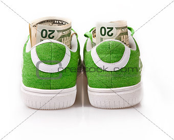 Dollars in green shoes