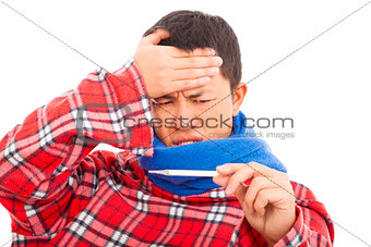 Sick young man measuring fever temperature with  thermometer