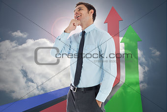 Composite image of thoughtful businessman with hand on chin
