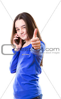 Teenage girl with smartphone poiting with her finger at camera