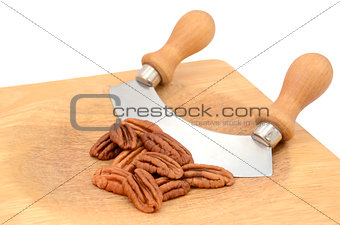 Pecan nuts with a rocking knife