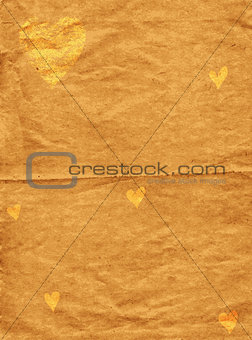 Old spotty grunge paper with gold hearts