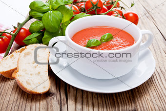 tasty fresh tomato soup basil and bread