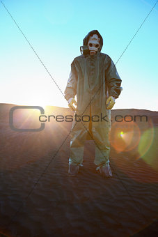 Man in protective suit and rays of sun