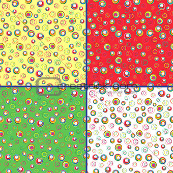 Four seamless vector patterns with colorful circles