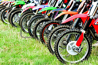 Motocross riders lined up before start on the race