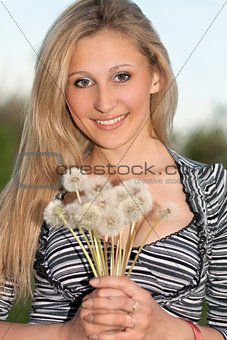 attractive blonde with  dandelions