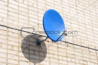 A satelite is attached to the wall 