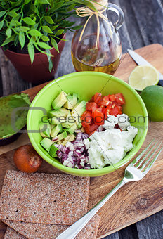Avocado, tomato, onion and feta cheese salad