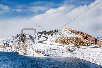 mountain lake and road in winter