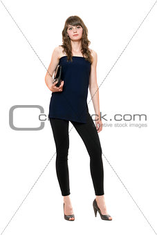 Young beautiful woman in a black leggings. Isolated