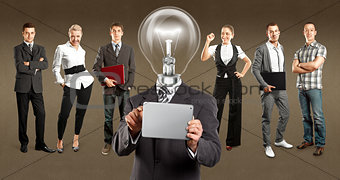 Business Team With Lamp Head