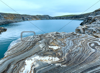 Striped stone near reservoir Storglomvatnet (Norge)