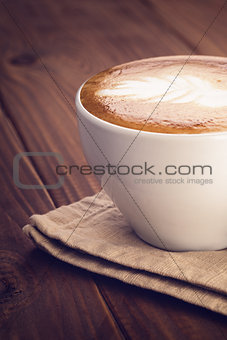 cappuccino on old wood table