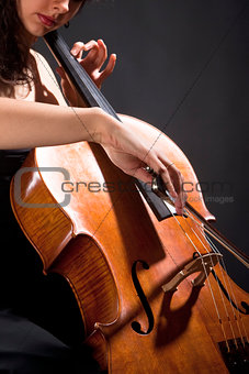 Female Musician Playing Violoncello