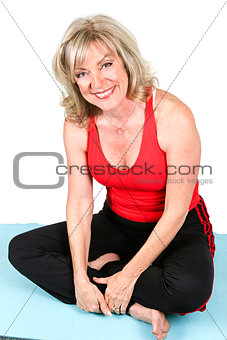 Beautiful Fit Senior on Yoga Mat
