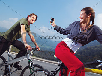 couple on bicycles in the park