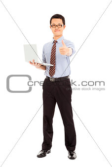 computer engineer is  standing and thumb up