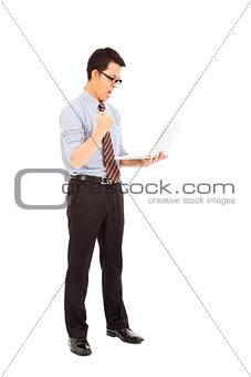 computer engineer is  standing and clench his hand