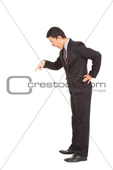 Angry businessman yelling and  pointing 