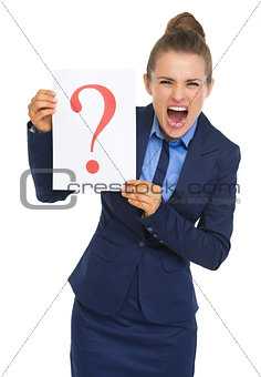 Frustrated business woman showing paper sheet with question mark