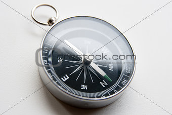 black compass on a white background in perspective