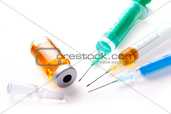 3 syringes and ampoules
