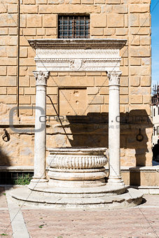 Historic fountain in Pienza
