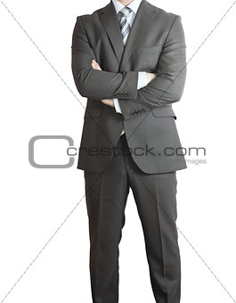 Man in suit standing with the cross arms