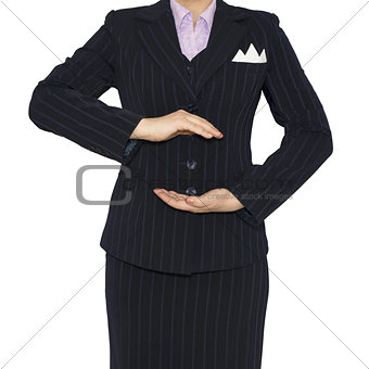 Woman in suit holding his hands before him