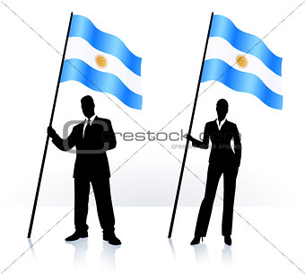 Business silhouettes with waving flag of Argentina