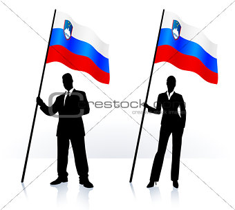 Business silhouettes with waving flag of Slovenia