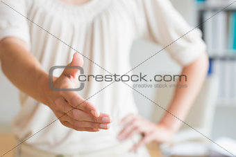 Businesswoman offering handshake