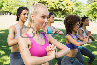 dedicated women exercising in park