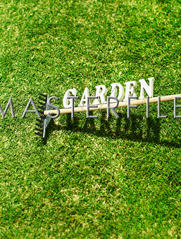 Garden sign on rake