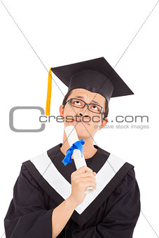 confusing graduation man thinking  and holding diploma