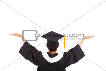  graduation student wearing a mortarboard and open hands