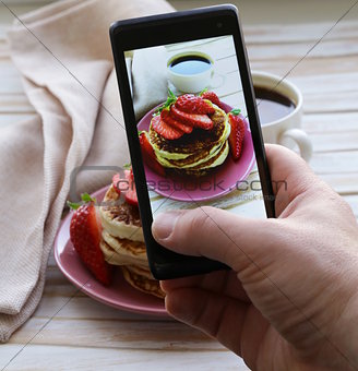 smartphone shot food photo  - pancakes for breakfast with fresh strawberries