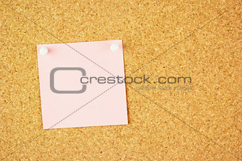Pink clear sticker pined on the cork